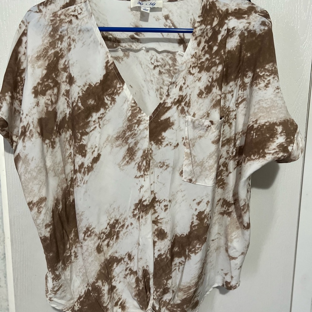 Brown and white spotted shirt
